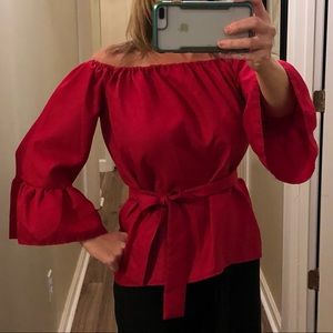 Dressy off the shoulder blouse.